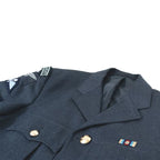 Close-up of lapels, medal ribbon bar, and Staybrite buttons on British RAF No1 dress tunic