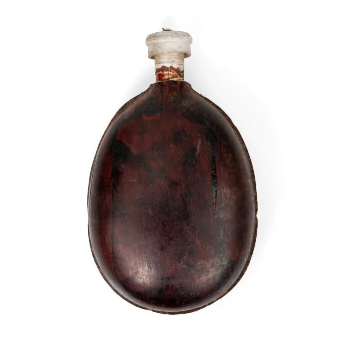 Front view of original WW2 Bulgarian Army coconut canteen with brown wood fiber composite shell