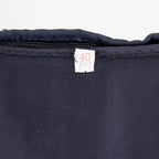 Close-up of military size 40 label tag inside coat