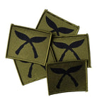 A pile of five unissued British Army Gurkha Brigade TRF patches in pristine supergrade surplus condition.