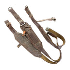 Folded Soviet military Y-strap suspenders showing metal friction buckles and canvas webbing