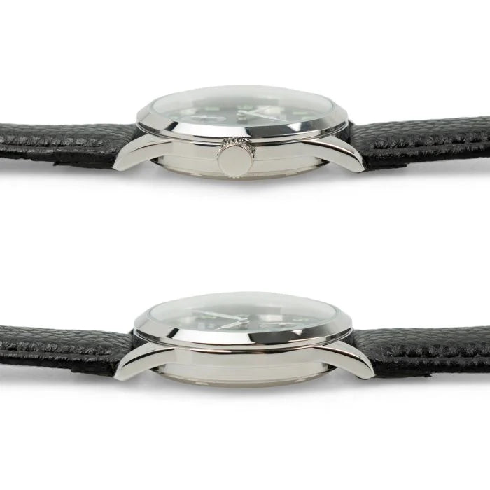 Side profile view showing the polished stainless steel case and domed crystal of the German service watch