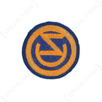 Rear view of US 102nd Infantry Division patch showing thread backing and merrowed edge construction