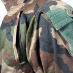 Close-up of the front zippered Napoleon chest pocket on the FELIN T4 CCE camo jacket