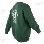 Three-quarter rear view of green jumper showing white Lycée Militaire Autun print