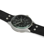 Angled side profile of the B-Uhr pilot watch highlighting the domed cut glass crystal and matte alloy case