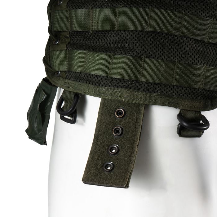 Close-up of the metal eyelets and adjustable strap attachment points at the bottom of the Dutch tactical vest