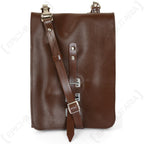 Front view of an original East German brown vinyl map case with adjustable shoulder strap and metal buckle closure.