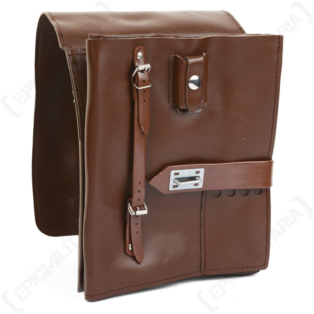 Side profile of the map case revealing the integrated pen holder, extra accessory pocket, and sturdy metal side clasp.