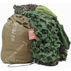 Czech Army camouflage net packed beside original stamped canvas storage bag