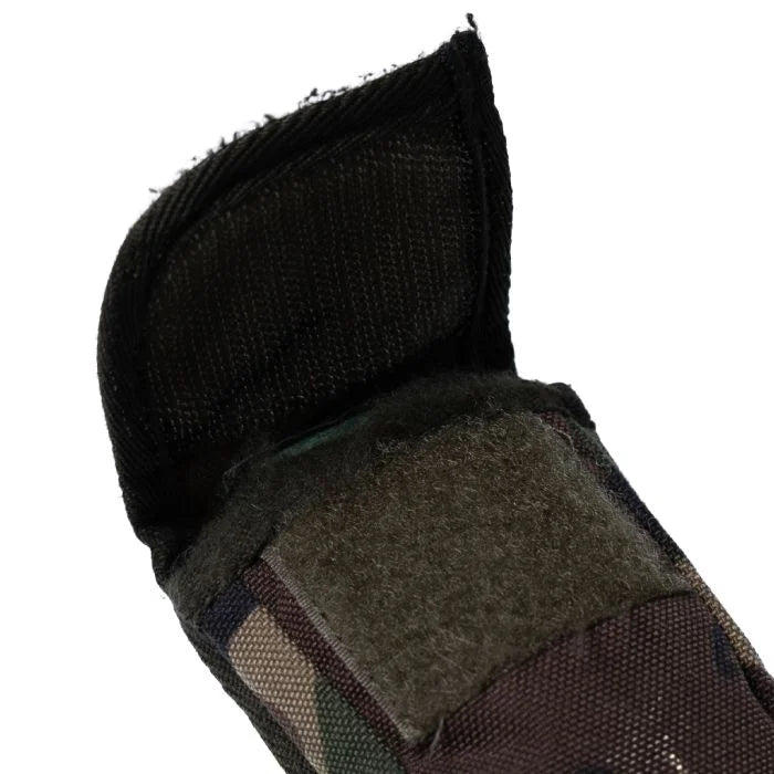 Close-up of the opened front flap showing the hook-and-loop Velcro closure of the Dutch military pouch