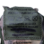 Close-up of official manufacturing label with NSN 8465-17-114-3451 on Dutch Glock pouch