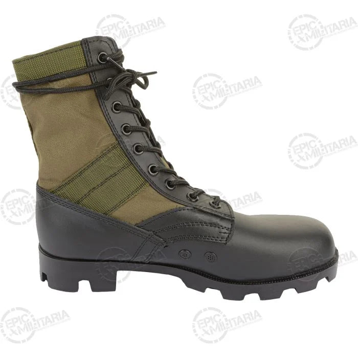 Medial side profile highlighting dual brass drainage vent ports along boot arch