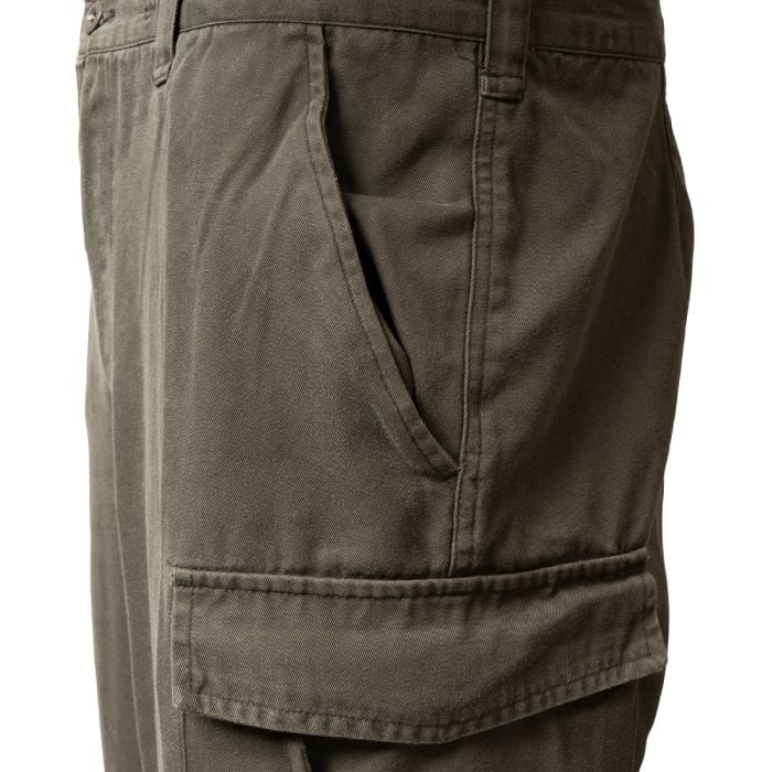 Detailed view of the deep side slash pocket and zippered cargo pocket flap on Austrian Army trousers.