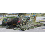 Rear view of Czech Army surplus camouflage net screening vehicles outdoors