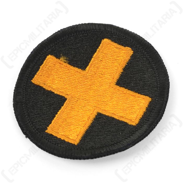 Side angle view of US 33rd Infantry Division Golden Cross shoulder patch