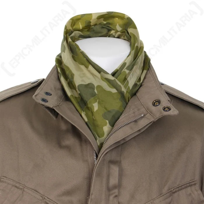 Close-up of US WW2 camouflage jump scarf tucked neatly into jacket collar