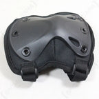 Close-up of thermoplastic rubber shell on black angled elbow pad