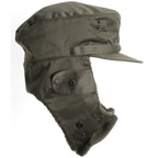Side profile of Austrian olive drab winter field cap showing extended fleece ear flaps and snap closures