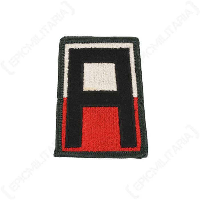 Front view of original US First Army shoulder patch featuring black letter A on red and white background