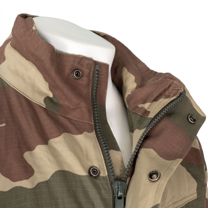 Close-up of sturdy central zip and collar snap buttons on Turkish Army Parka