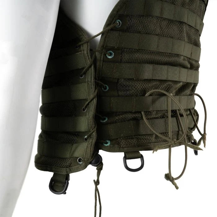 Close-up of the side lacing with green-painted brass eyelets and elastic cord