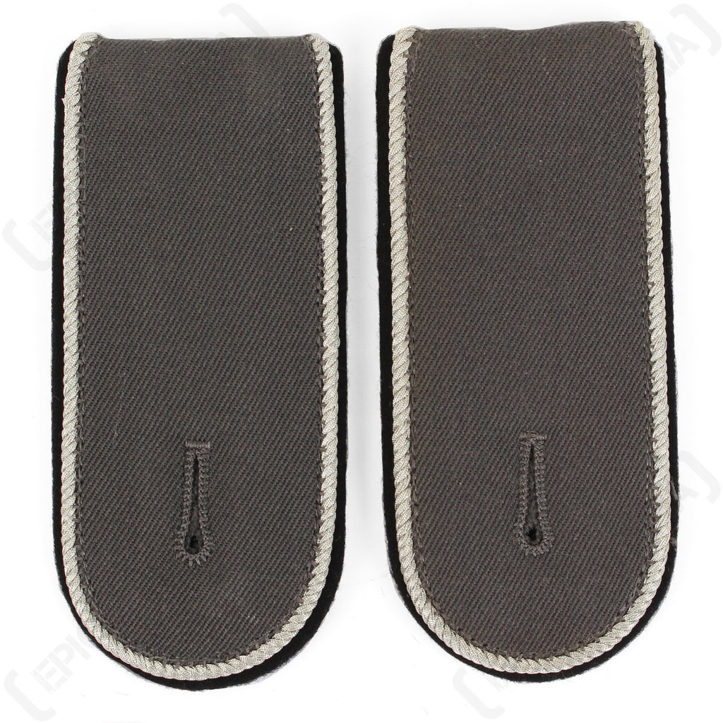 Pair of dark grey wool German Bundeswehr officer shoulder boards with braided edge piping and integrated tunic attachment tabs.