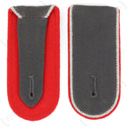 Genuine Bundeswehr shoulder boards in red artillery branch color, showing the wool construction and buttonhole attachment design.