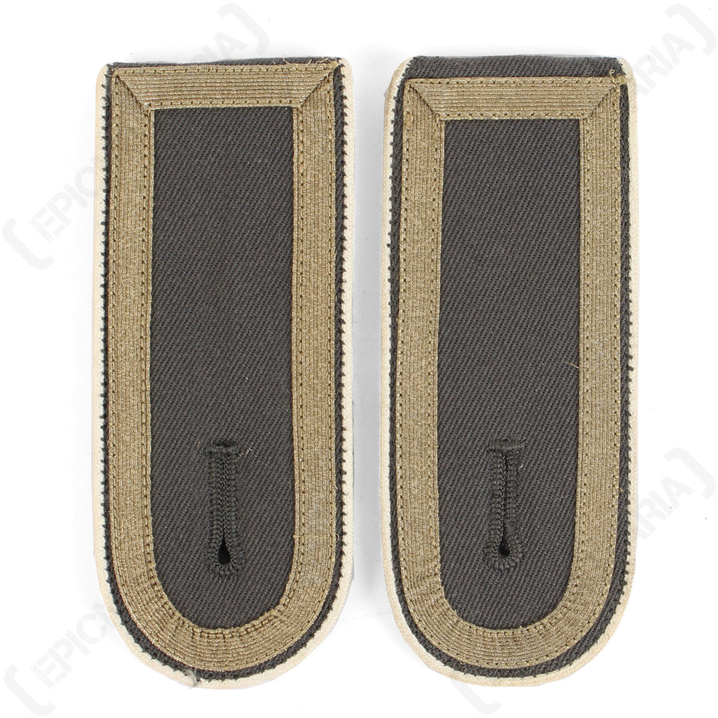 Front view of surplus German Bundeswehr Stabsunteroffizier shoulder boards with tan tresse on a dark grey wool base.