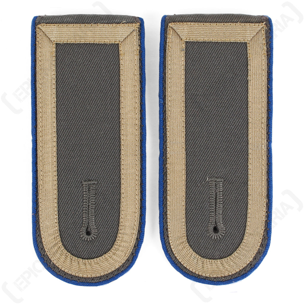 Pair of German Bundeswehr Stabsunteroffizier shoulder boards featuring blue piping, used military surplus condition.