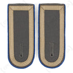 Pair of German Bundeswehr Stabsunteroffizier shoulder boards featuring blue piping, used military surplus condition.