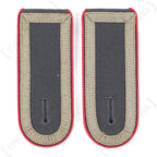 Pair of German Bundeswehr Stabsunteroffizier shoulder boards with red piping, viewed from the front for collector details.