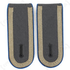 Pair of German Unteroffizier rank boards with blue piping trim and grey fabric, suitable for uniform display.