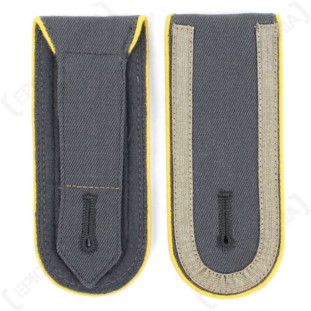 Reverse side of German Bundeswehr shoulder boards showing the fabric attachment flap and front facing view.