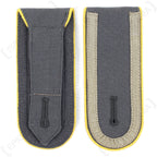 Reverse side of German Bundeswehr shoulder boards showing the fabric attachment flap and front facing view.