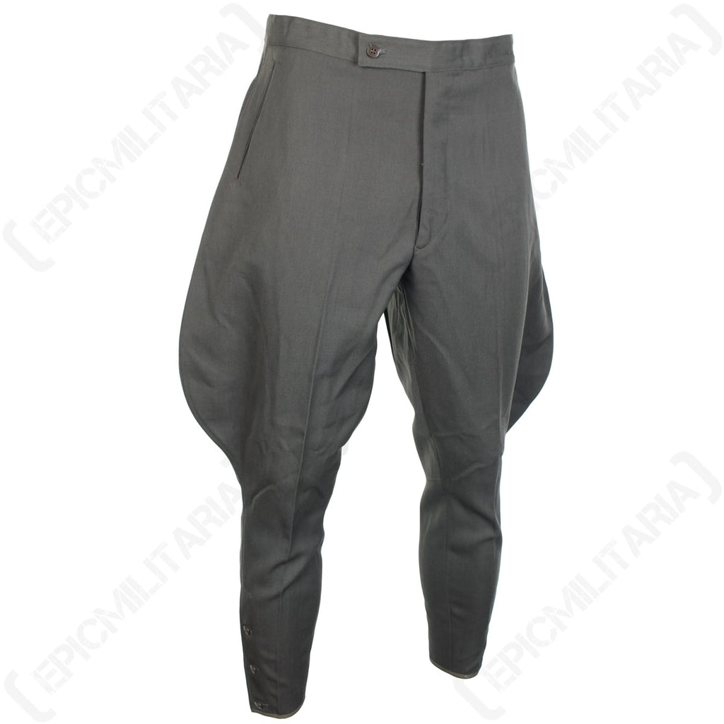 Angled side view of authentic military surplus German Officer jodhpurs, highlighting the traditional waist closure and tailored design.