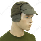 German Army surplus winter cap in olive green with fleece-lined ear flaps folded up in the side profile view.