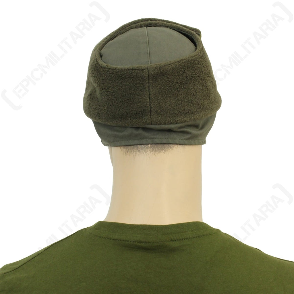 Rear angle of the German Army winter cap with the soft fleece-lined ear flaps folded upwards.