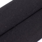 Macro view of the durable woven fabric on an authentic German Army necktie, highlighting the unique texture and signs of vintage wear.