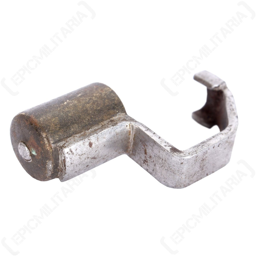 Original brass Mauser 1935 muzzle cover with a protective steel bracket for rifle barrel mounting.