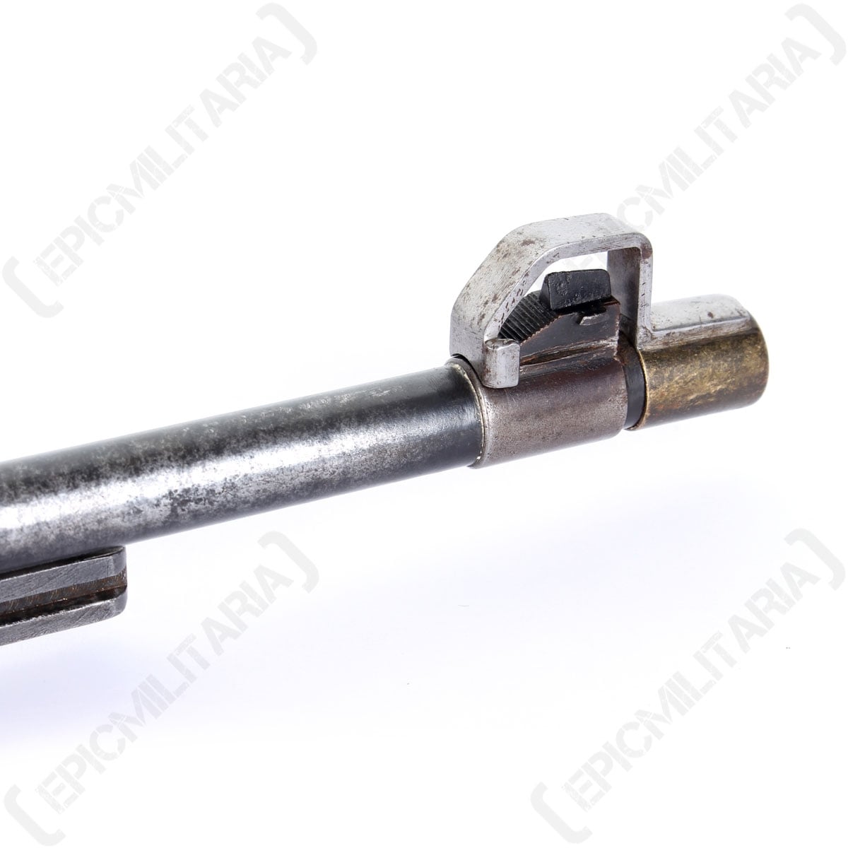 Mauser 1935 muzzle cover securely fitted over the front sight of a rifle barrel.