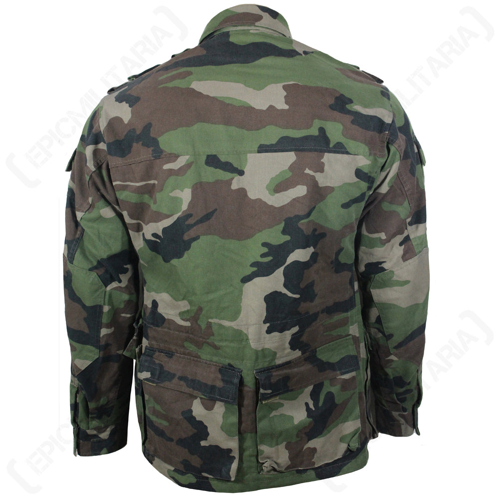 Rear view of M97 Slovakian military field jacket showing durable woodland camouflage pattern, waist adjustment capability, and lower rear pockets.