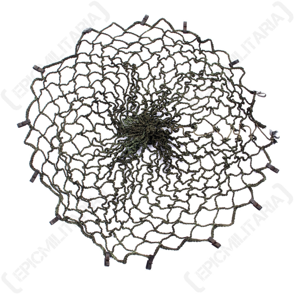 Full view of an olive drab East German NVA surplus helmet net featuring an open mesh design and metal attachment clips.