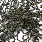 Close-up detail of the central knotted structure of the olive drab NVA helmet net showing the durable military-grade cord.