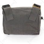 Rear view of an original 37 Pattern British Army small pack, showing durable canvas construction and metal attachment buckles.