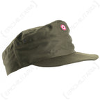 Side profile of an unissued Austrian Army olive drab field cap featuring two ventilation eyelets and the distinctive mountain cap shape.