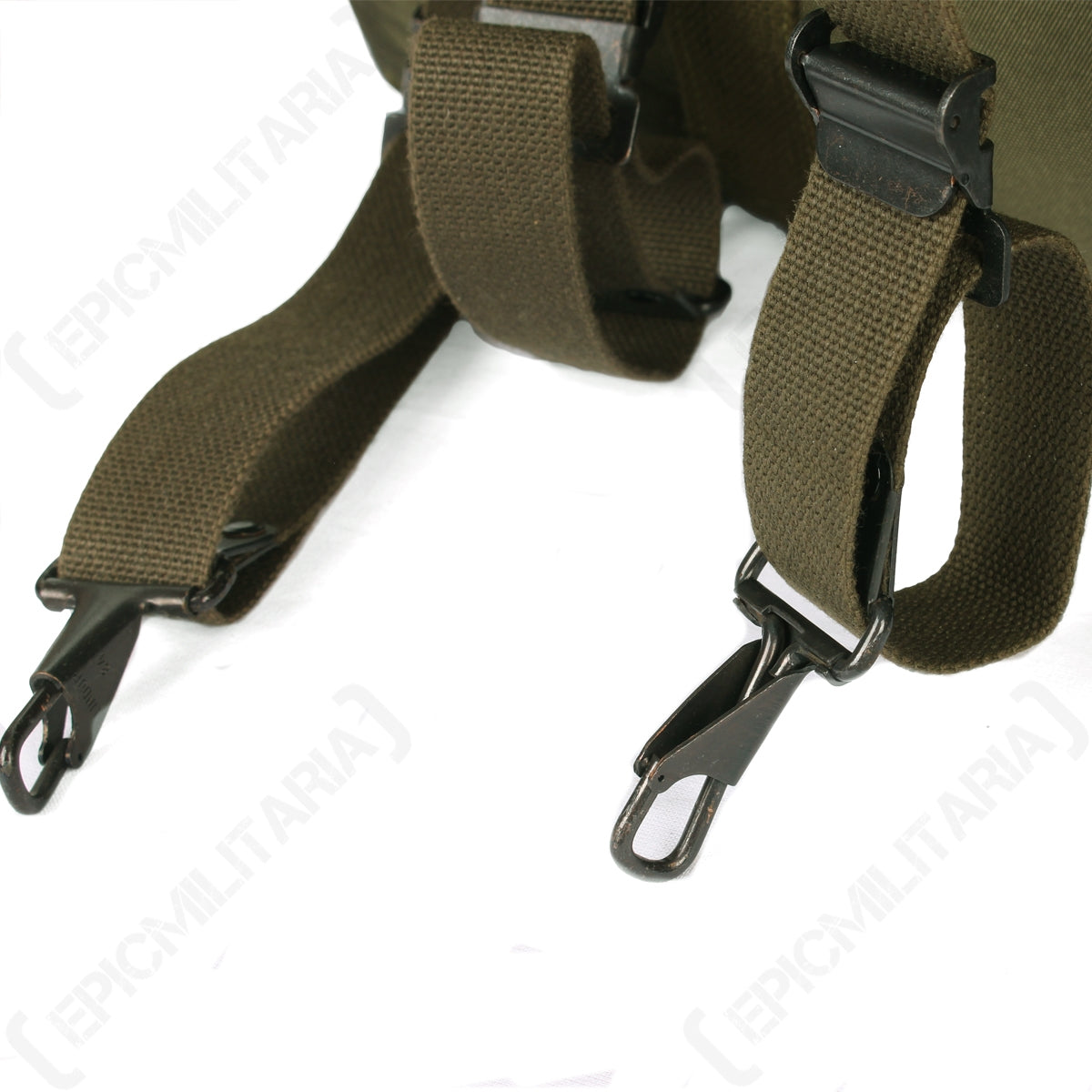 Close-up of padded webbing shoulder straps with robust, quick-release steel spring clips for rapid deployment.