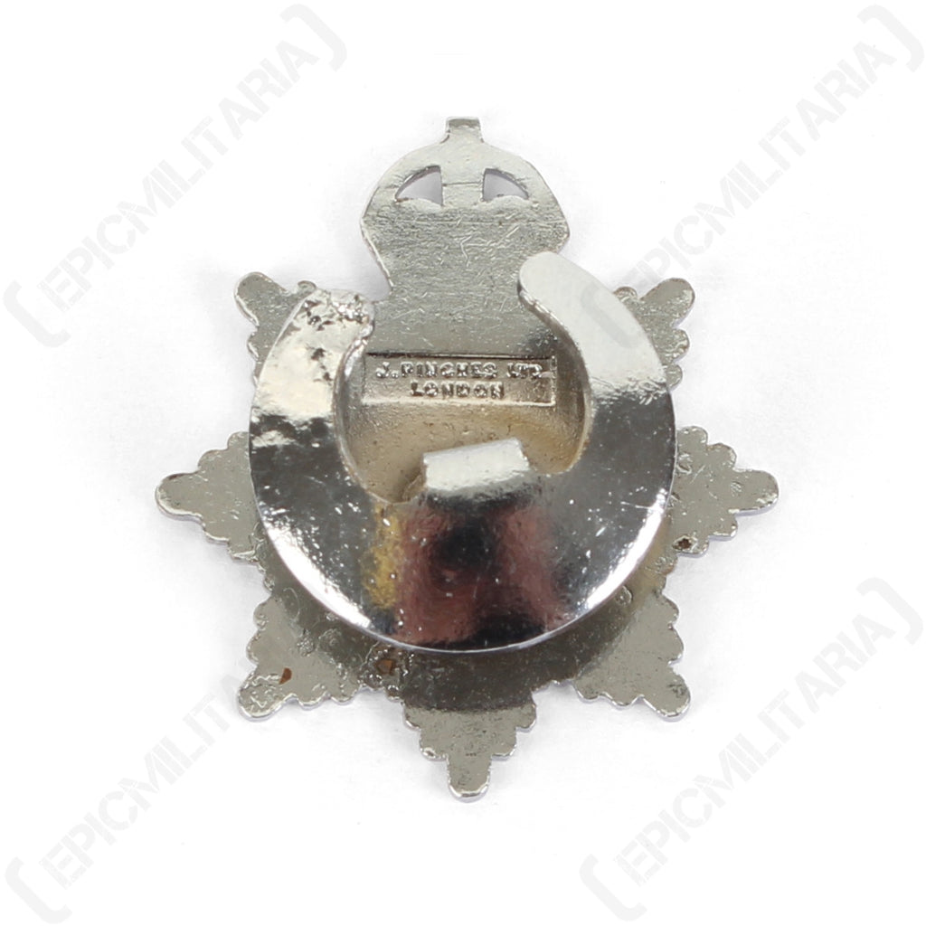 Reverse view of the silver WW2 AFS lapel badge showing the maker's mark J. PINCHES LONDON and the secure buttonhole crescent fitting.