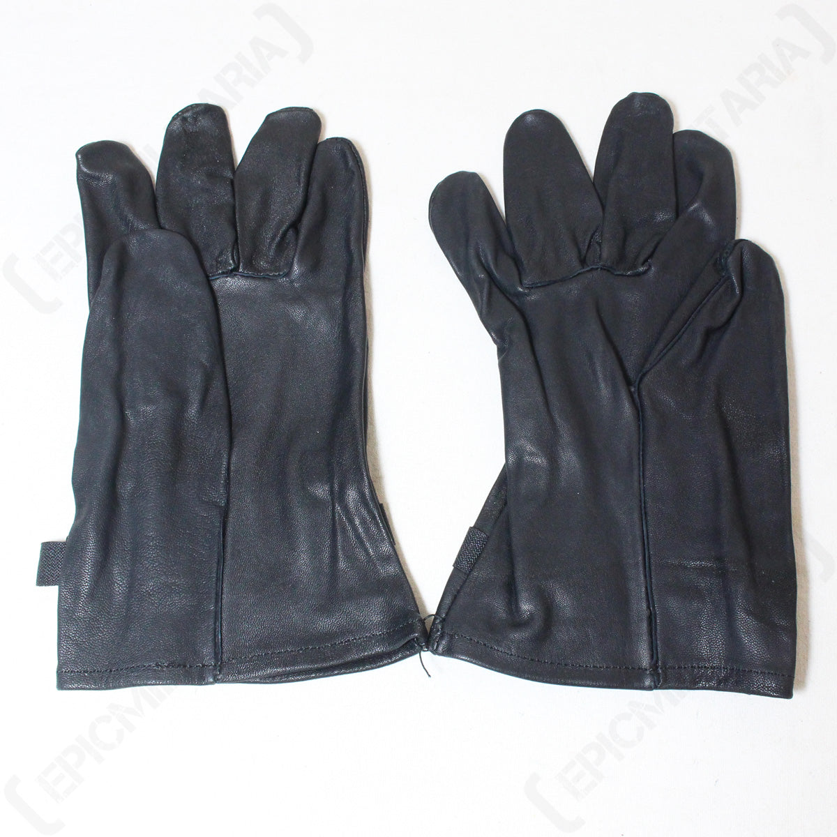 Reverse view of the black cowhide Belgian Army surplus gloves, highlighting the unlined interior and clean leather construction.