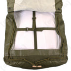 Interior view of the lower gear compartment showing adjustable compression straps and metal buckles.